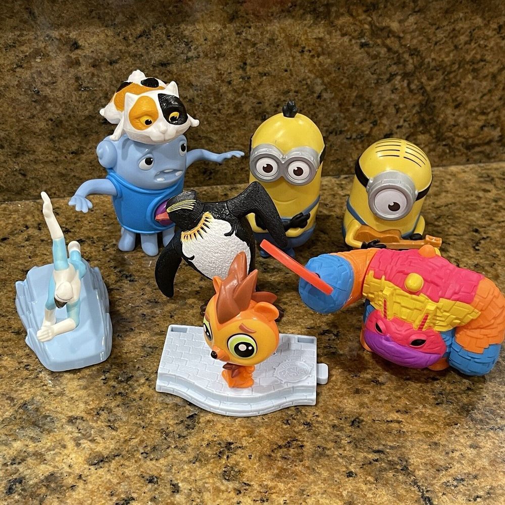 McDonalds‎ Happy Meal Toys Lot Of 7 Minions Monster Penguin Athlete Squid Dog